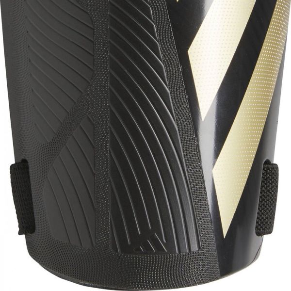 Futbalový chránič Adidas Tiro SG TRN, čierno-zlatý