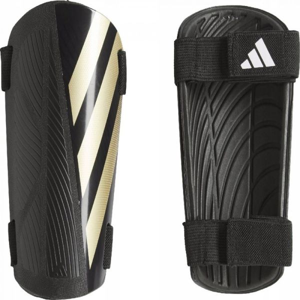 Futbalový chránič Adidas Tiro SG TRN, čierno-zlatý Futbalový chránič Adidas Tiro SG TRN, čierno-zlatý