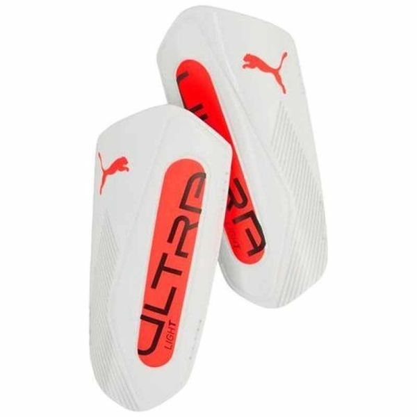 Futbalový chránič Puma Ultra Light Strap, farba biela a oranžová Futbalový chránič Puma Ultra Light Strap, farba biela a oranžová